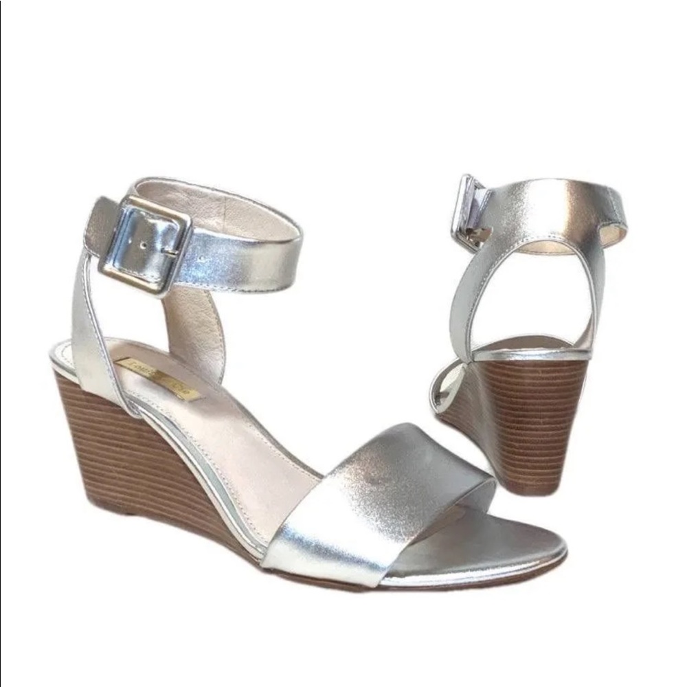 Silver color. Wedge style.